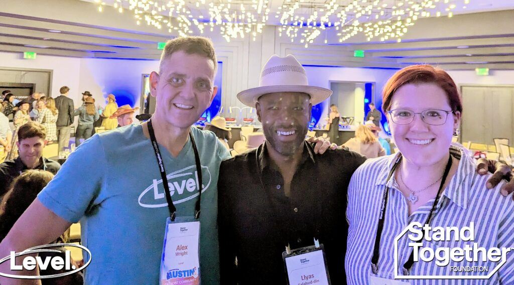 The team at Level at an event with Stand Together Foundation